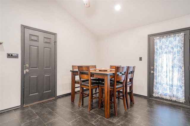 dining area with lofted ceiling