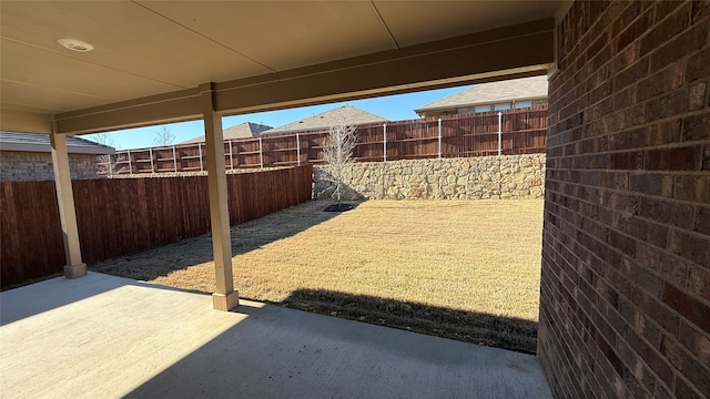 view of patio featuring a fenced backyard