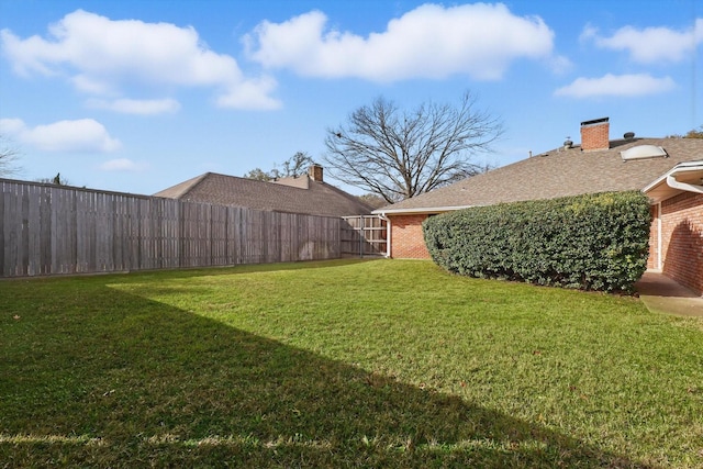 view of yard with fence