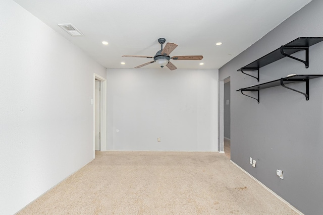 unfurnished room featuring carpet floors, visible vents, a ceiling fan, and recessed lighting