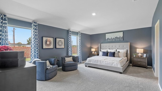 bedroom featuring carpet floors and baseboards