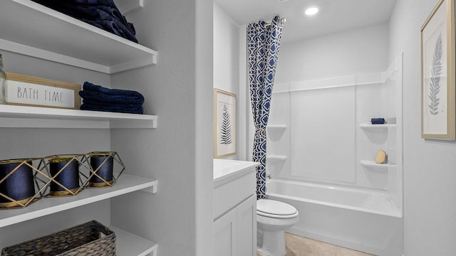 full bathroom with shower / tub combo, tile patterned flooring, vanity, and toilet