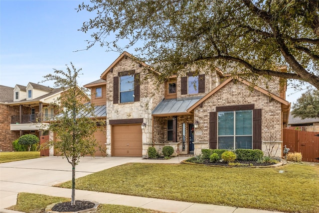 view of front of property with a garage, a standing seam roof, driveway, and metal roof