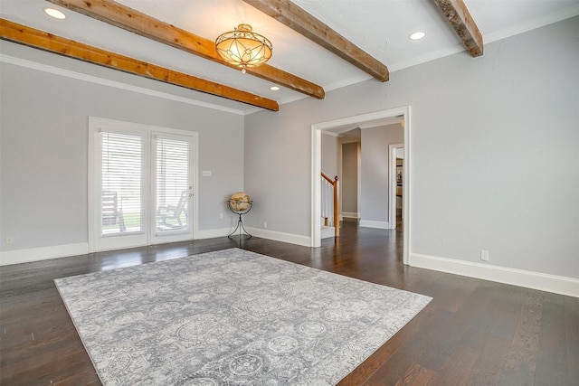 unfurnished room with baseboards, dark wood finished floors, beamed ceiling, and recessed lighting