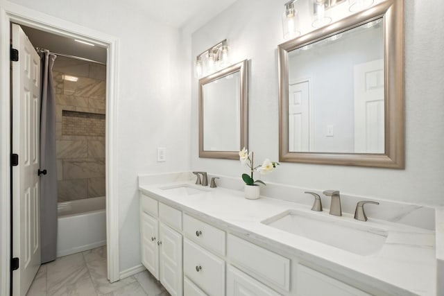 bathroom with shower / tub combo, marble finish floor, a sink, and double vanity