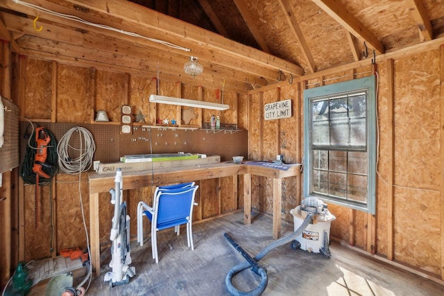 interior space featuring vaulted ceiling