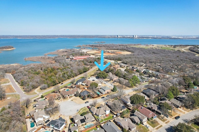 aerial view with a water view and a residential view