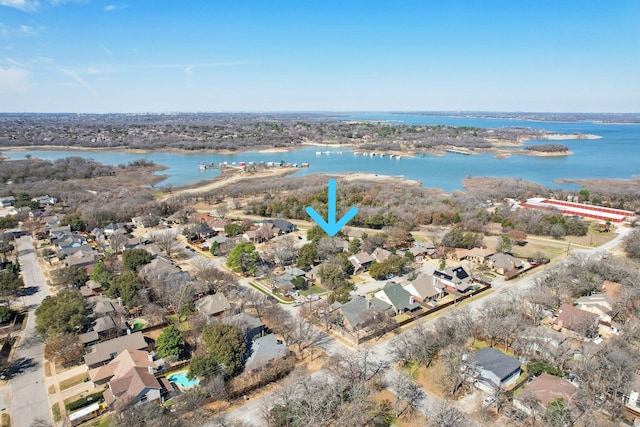 aerial view with a residential view and a water view