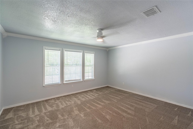 carpeted empty room featuring visible vents, crown molding, baseboards, and ceiling fan