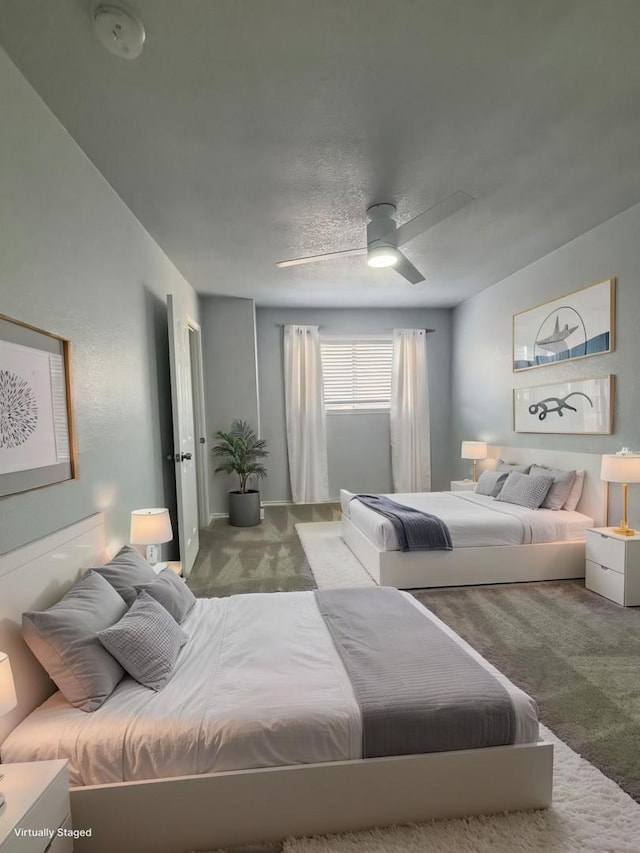 6512 Willow Oak Ct, Fort Worth, TX 76112 - bedroom with ceiling fan, carpet, and a textured ceiling