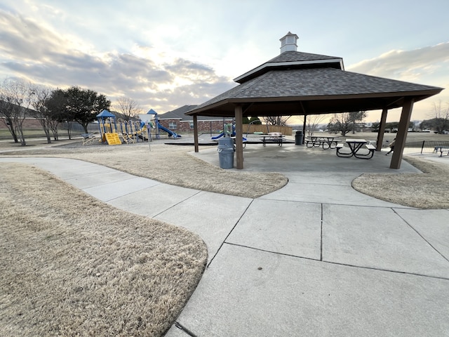 view of community featuring playground community and a gazebo