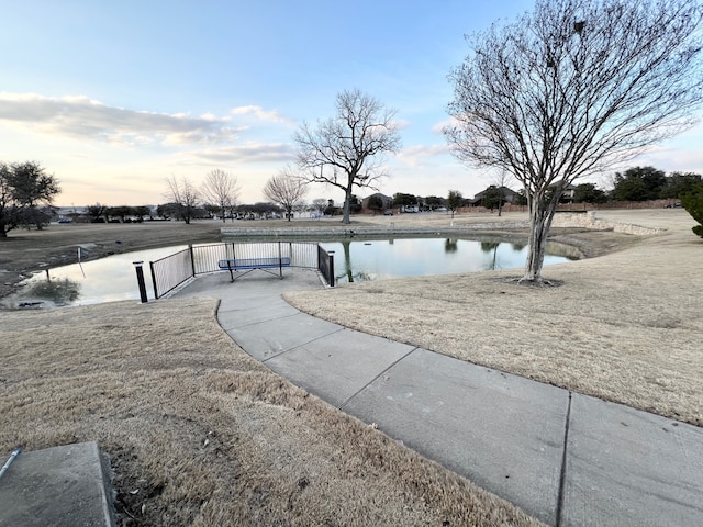 exterior space with a water view