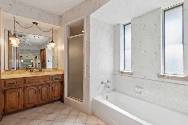 full bath with a textured ceiling, a shower stall, and wallpapered walls