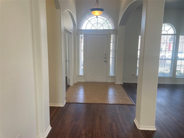 entrance foyer with plenty of natural light and wood finished floors