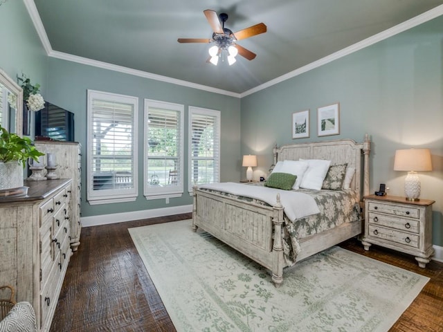 bedroom featuring dark wood-style floors, baseboards, ornamental molding, and ceiling fan