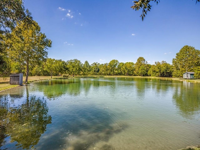 property view of water with a view of trees