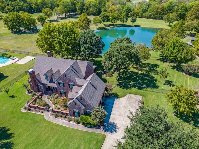 bird's eye view with a water view