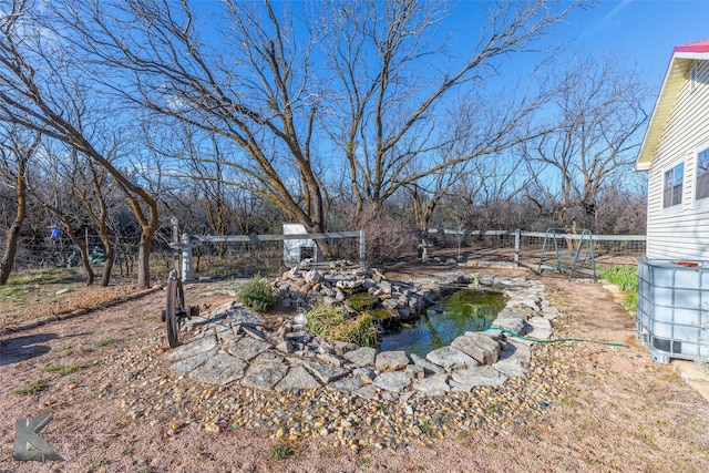 view of yard with fence