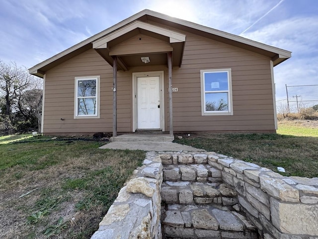 view of front of property with a front lawn