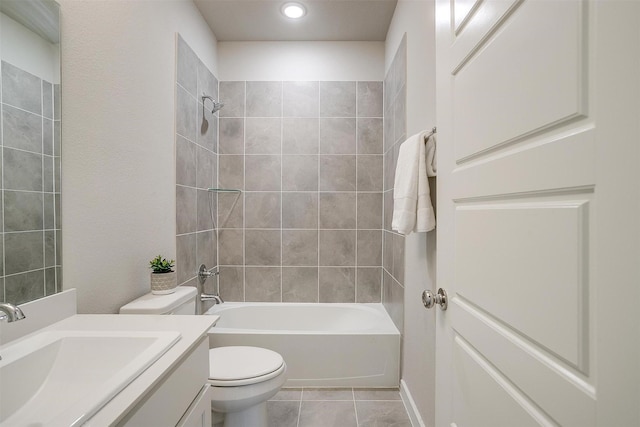 full bathroom featuring tile patterned flooring, shower / tub combination, vanity, and toilet