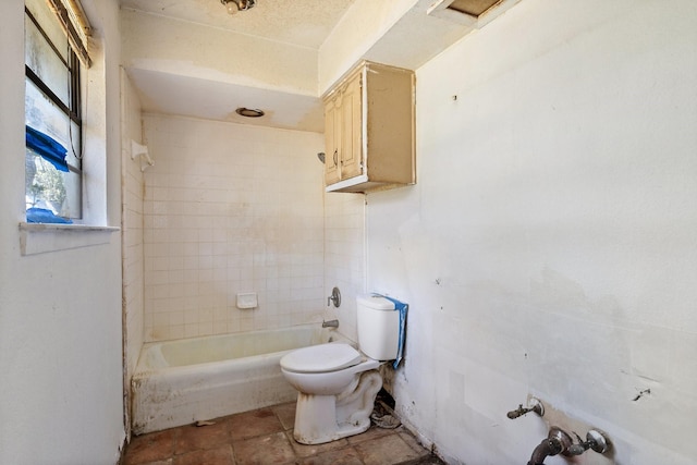 full bath featuring shower / tub combination and toilet