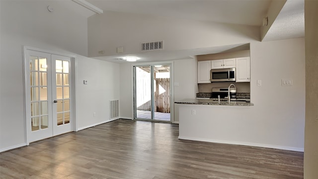 kitchen with french doors, appliances with stainless steel finishes, a sink, and visible vents