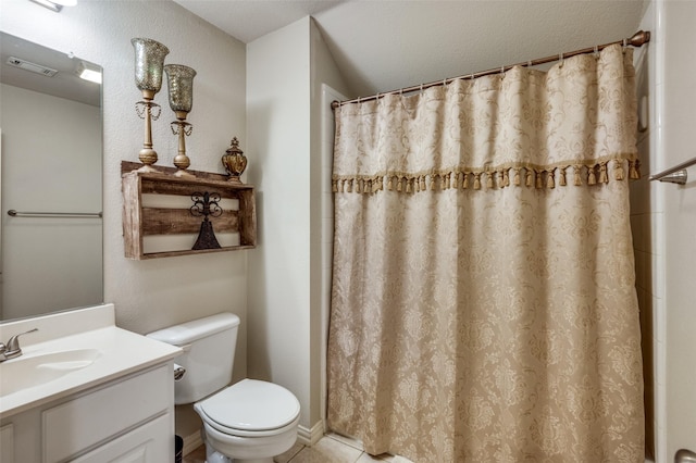 bathroom with visible vents, toilet, a shower with curtain, tile patterned floors, and vanity