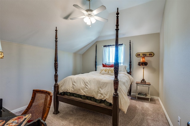 carpeted bedroom featuring vaulted ceiling, a ceiling fan, and baseboards