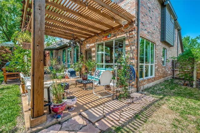 view of patio / terrace with fence and a pergola