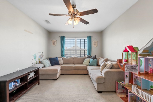 carpeted living area featuring ceiling fan and visible vents