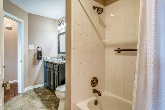 bathroom with toilet, baseboards, shower / tub combo with curtain, and vanity