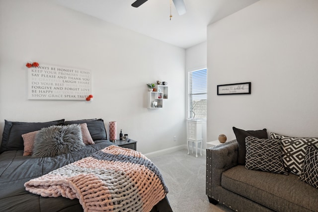 bedroom featuring a ceiling fan, baseboards, and carpet flooring