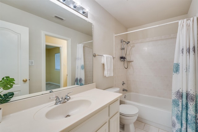 full bathroom with visible vents, toilet, tile patterned floors, shower / bath combo with shower curtain, and vanity