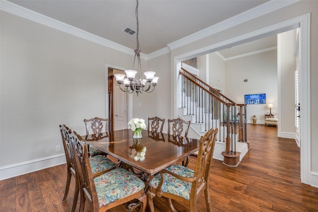 dining space with crown molding, visible vents, wood finished floors, baseboards, and stairs