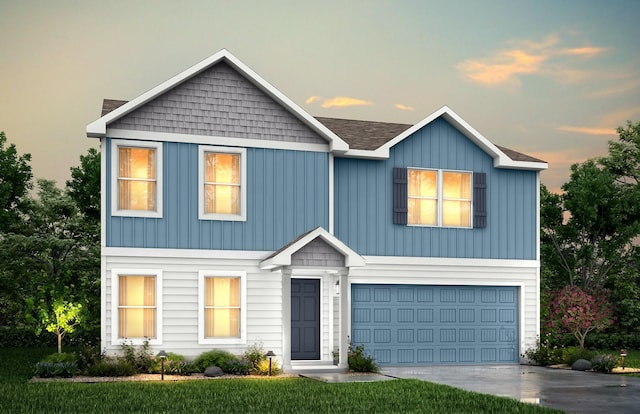 view of front of home with driveway, a garage, and board and batten siding