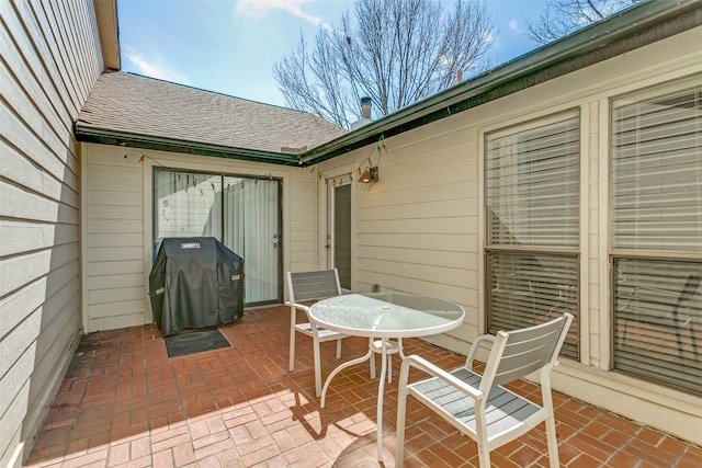 view of patio / terrace with a grill and outdoor dining space