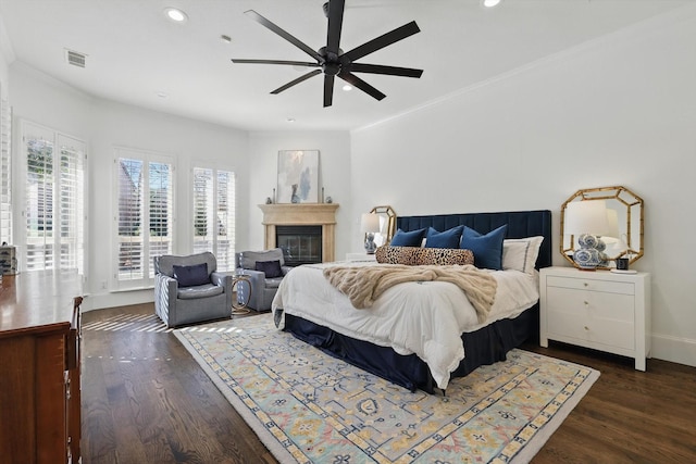 bedroom featuring baseboards, visible vents, dark wood-style flooring, and recessed lighting