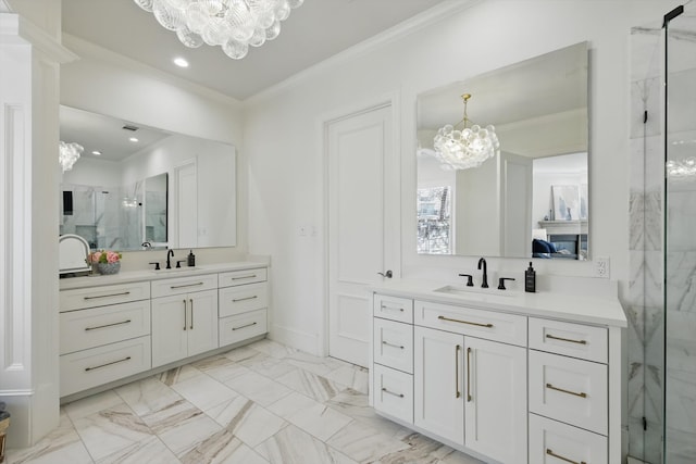 bathroom with crown molding, a notable chandelier, and a sink