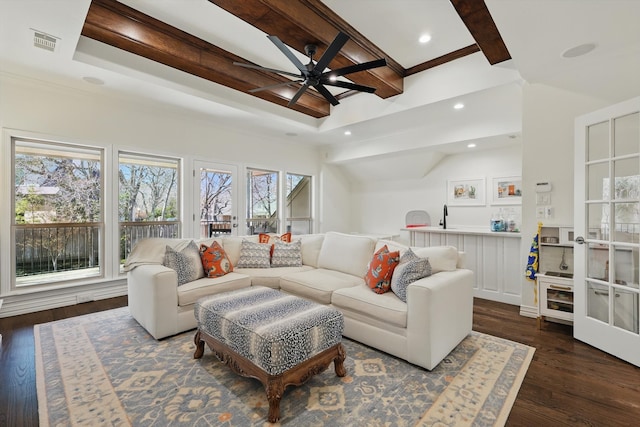 living room featuring visible vents, ceiling fan, dark wood-style flooring, beamed ceiling, and recessed lighting