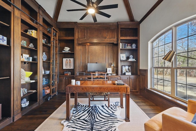 office featuring vaulted ceiling with beams, ceiling fan, built in features, and dark wood finished floors