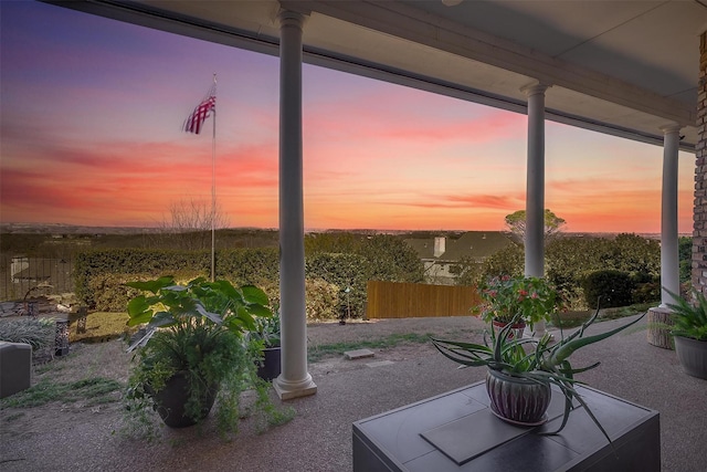 view of patio featuring fence