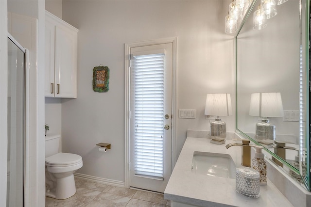 full bath with baseboards, vanity, toilet, and an enclosed shower