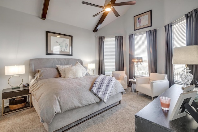 bedroom featuring light colored carpet, beamed ceiling, and multiple windows