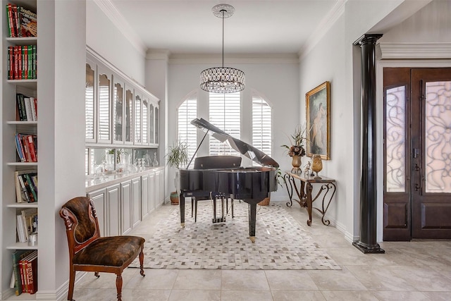 living area featuring baseboards, light tile patterned flooring, crown molding, and ornate columns