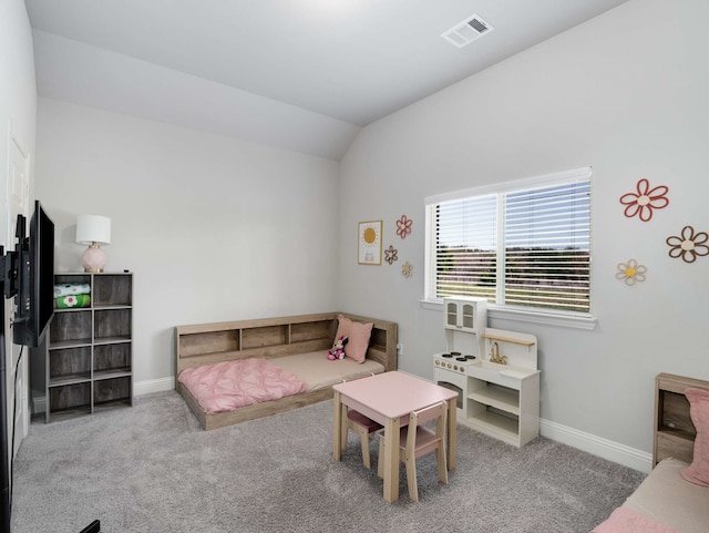 bedroom featuring carpet flooring, vaulted ceiling, visible vents, and baseboards