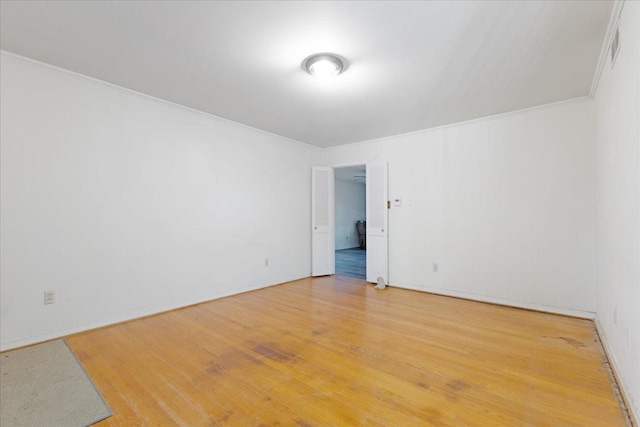 empty room with wood finished floors