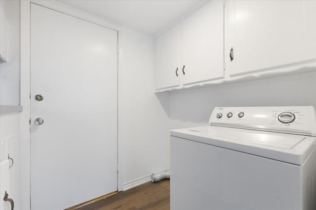 laundry area featuring washer / clothes dryer, dark wood finished floors, and cabinet space