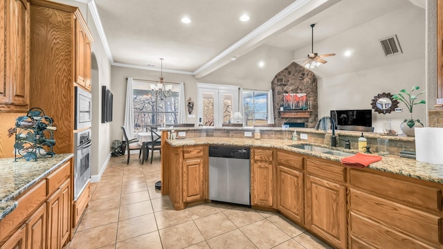 kitchen featuring visible vents, appliances with stainless steel finishes, brown cabinets, ornamental molding, and a sink