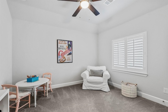 living area featuring a ceiling fan, carpet, visible vents, and baseboards