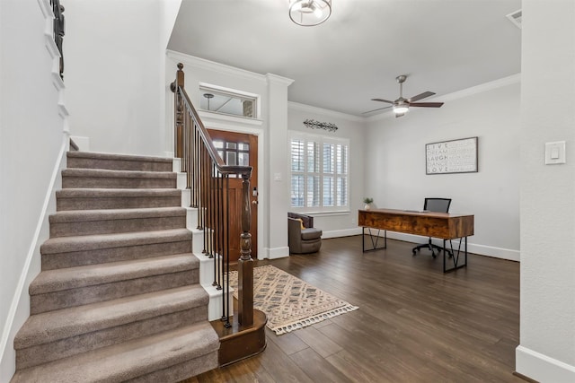 interior space featuring dark wood-style floors, stairway, baseboards, and crown molding